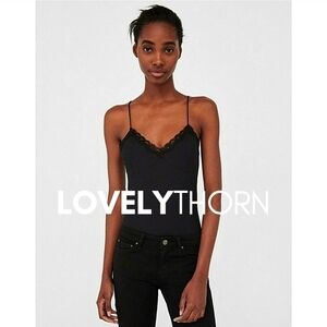 ZARA // striped black fabric w/ lace trim bodysuit